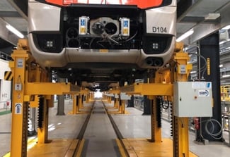 Image of Bus on Lifting System