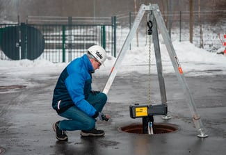 Image of Man in hardhat on an outdoor construction site