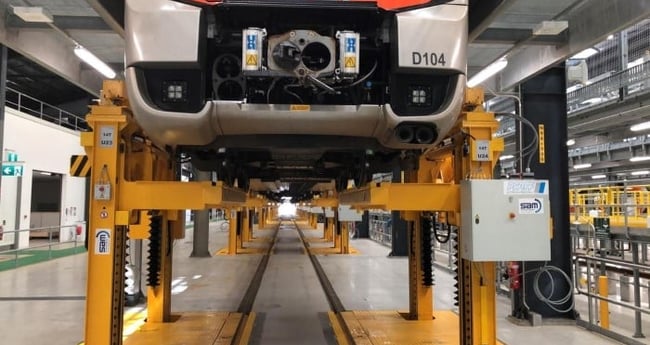 Image of Bus on Lifting System