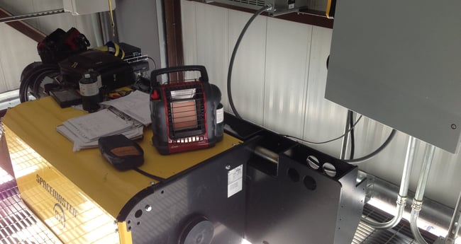 Image of IMPULSE•VG+ crane control drives and radio remote controls on desk