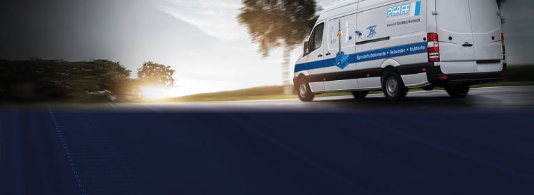 Image of Pfaff-silberblau van driving down the road