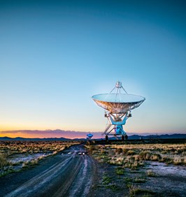 White Radar Telescope on Grass Field